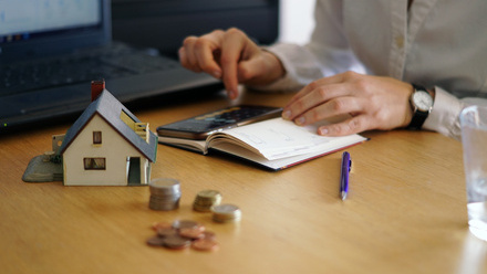 closeup-shot-person-thinking-buying-selling-house.jpg